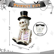 Glitzhome 10.25in. H Halloween Lighted Resin Skull Book Table Decor