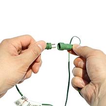 Glitzhome 11 Ft. Preloaded LED Pencil Fir Artificial Christmas Tree