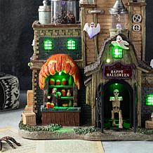 Glitzhome 11"H Lighted Resin Halloween Haunted House Village