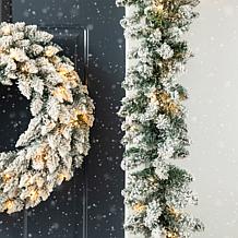 Glitzhome 2pk 6' Flocked Christmas Garland with Warm White LED Lights