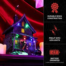 Haunted Hill Farm 1-Ft. Animated LED Haunted House with Flying Witc...