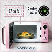 Nostalgia NRMO7PK6A Retro 0.7 CuFt 700-Watt Countertop Microwave, Pink