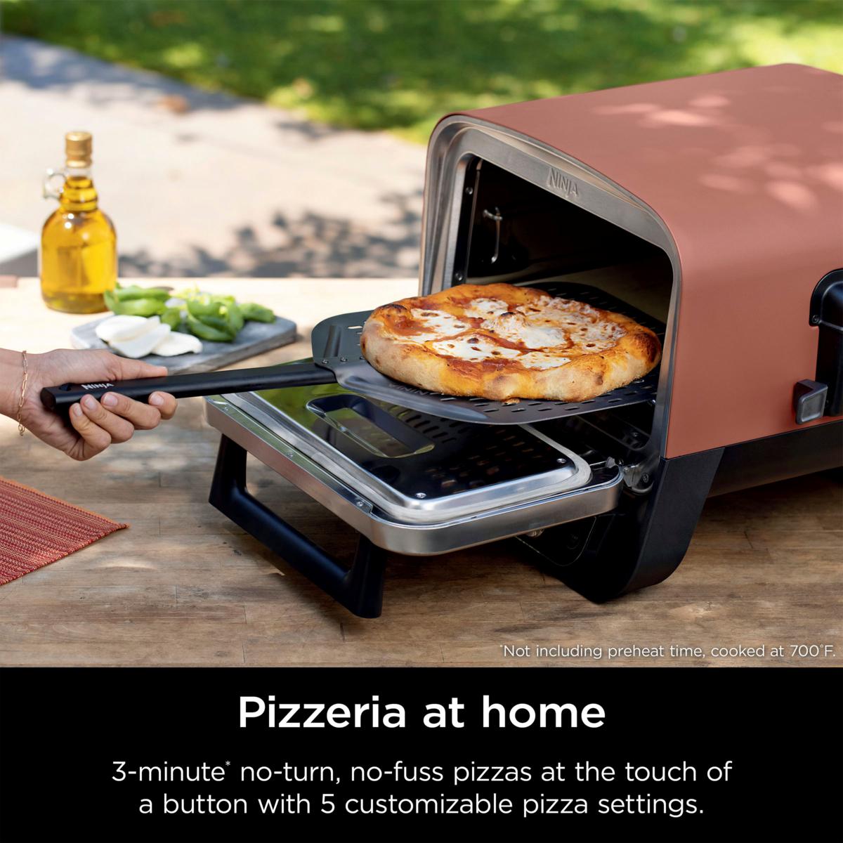 https://i01.hsncdn.com/is/image/HomeShoppingNetwork/rocs1200/ninja-woodfire-8-in-1-outdoor-oven-with-pizza-peel-d-2023111712491306~848312_alt8.jpg