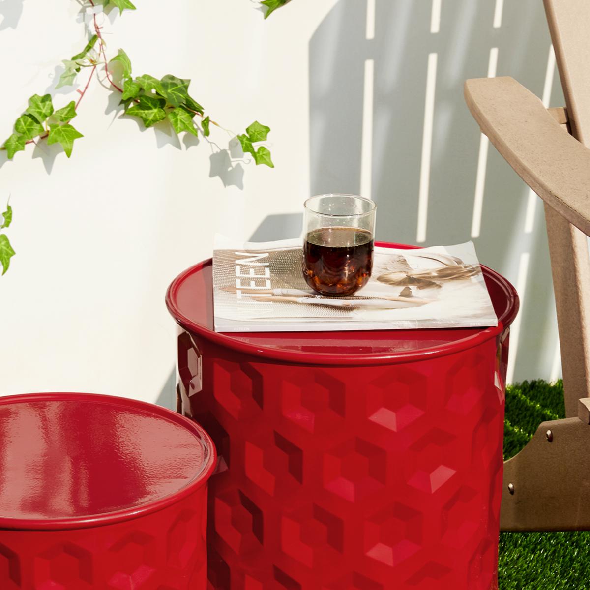 red metal garden stool