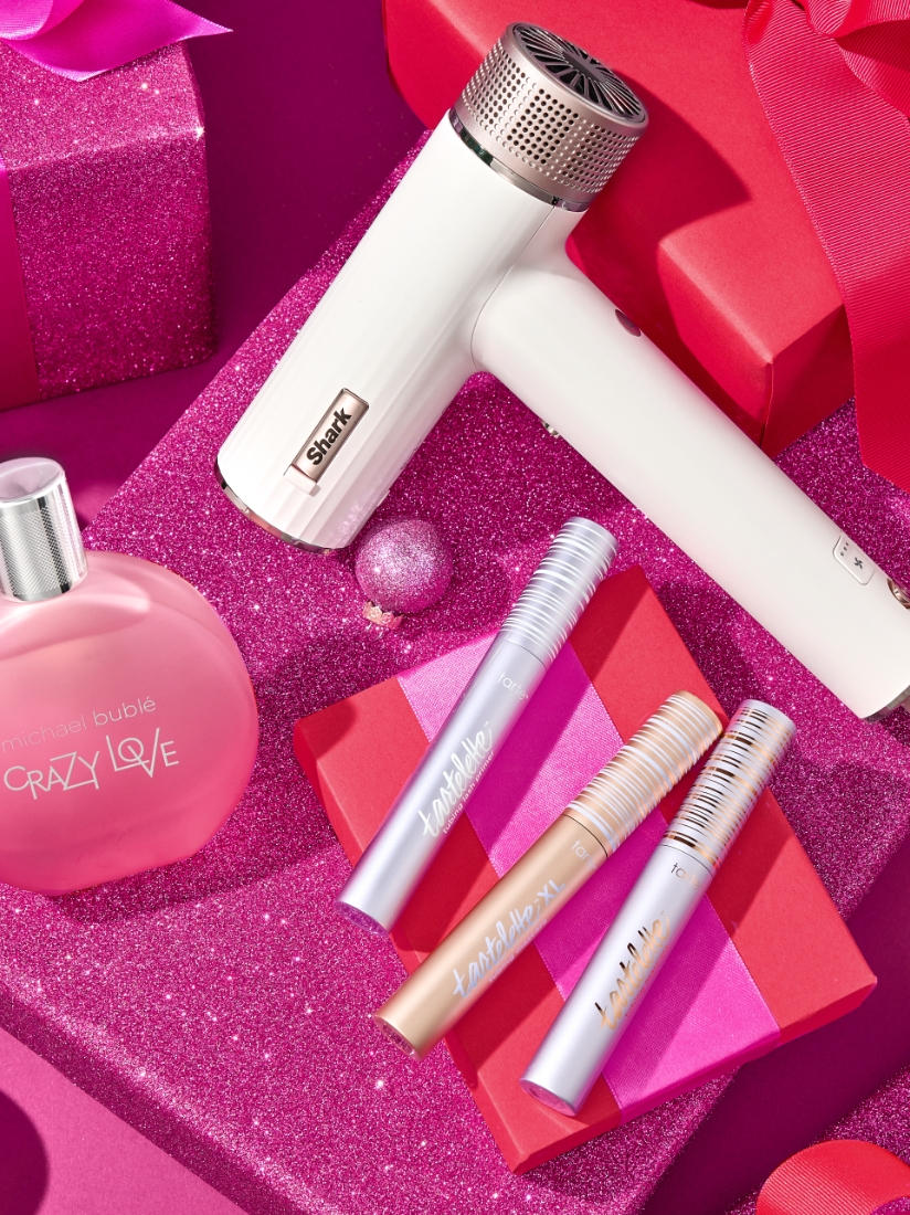 A man in red with a gift